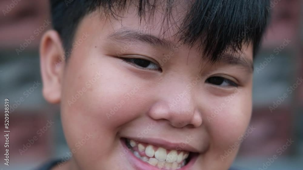 Smiling Face, Happy Expression of Asian Little Kid, Boy, Children. Close Up Shot Smiling Face, Happy Expression of Asian Little Kid, Boy, Children. Close Up Shot