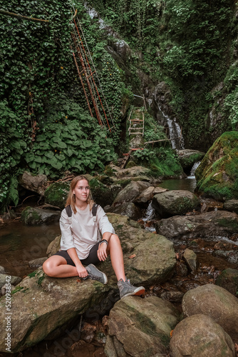 Travel. Girl travels through the mountains and waterfalls of wild nature. Unity  mental health  eco travel. Hiking in the mountains  van life vibes  travelling good moments  digital detox