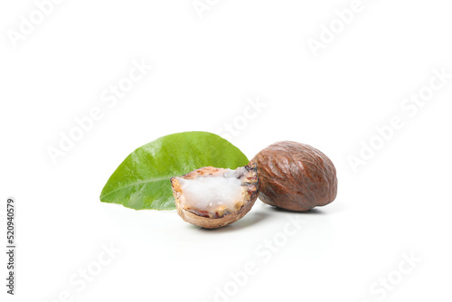 Shea nut halves isolated on white background