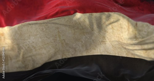 Old Yemen Flag waving at wind. Loop photo