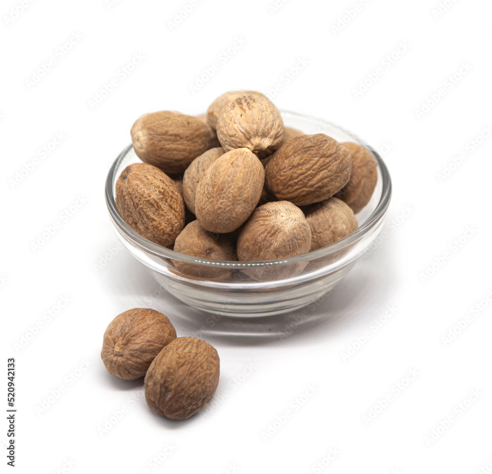 Sri Lankan nutmeg with shell spice. Authentic nutmeg with shell spice on a solid white background. Sri Lankan nutmeg with shell spice. Authentic nutmeg with shell spice on a solid white background.