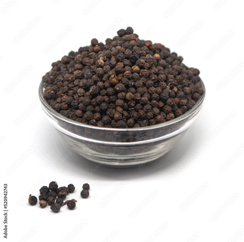 Sri Lankan black paper spice. Authentic Ceylon black paper spice on a solid white background. Sri Lankan black paper spice. Authentic Ceylon black paper spice on a solid white background.