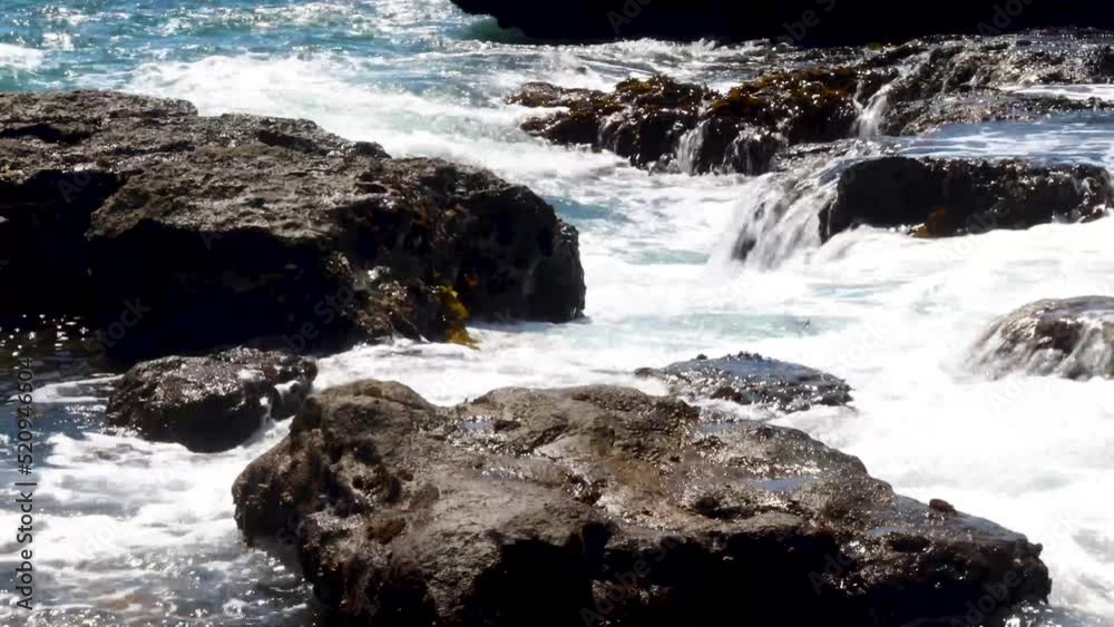 Refreshing cold seas splash on rugged rocks in the Pacific Northwest. Refreshing cold seas splash on rugged rocks in the Pacific Northwest.