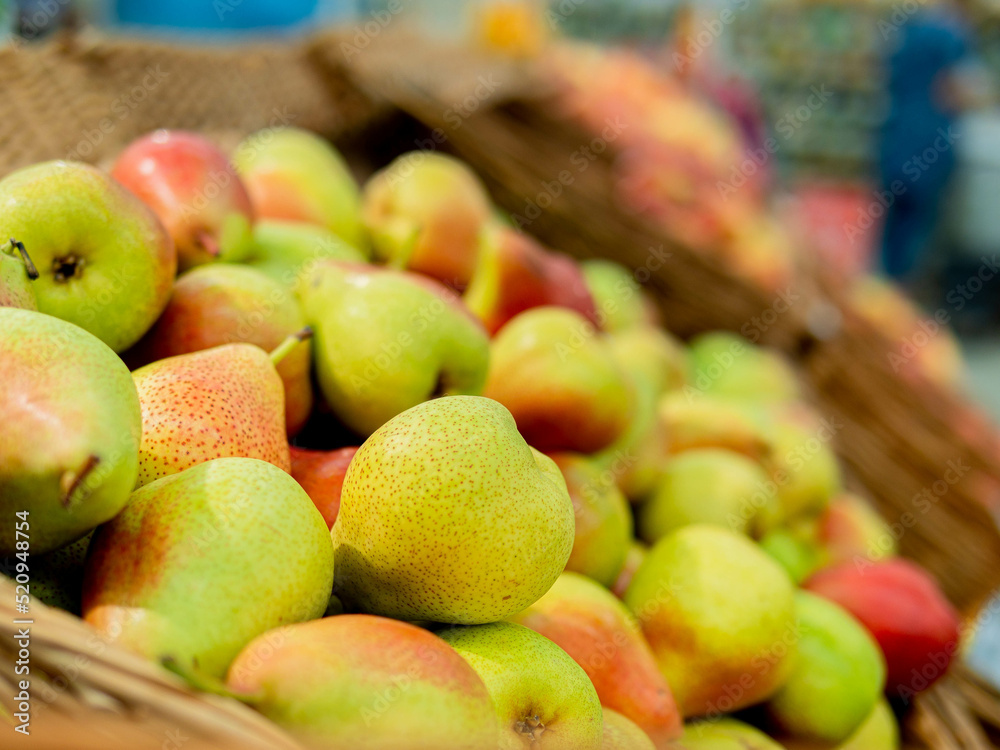 Delicious pears that are sold in the market. Fruit without chemicals. Close-up. Natural vitamins, fruits that help strengthen the immune system in the body from the virus. Delicious pears that are sold in the market. Fruit without chemicals. Close-up. Natural vitamins, fruits that help strengthen the immune system in the body from the virus.