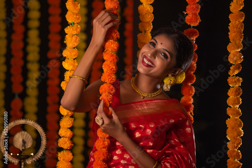 Portrait of Indian woman in traditional outfit on the occasion of Diwali photo