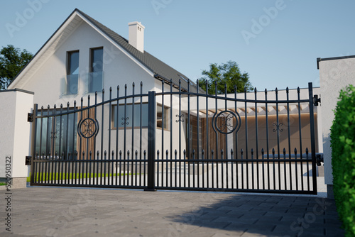 Wrought classic iron gate and single family house