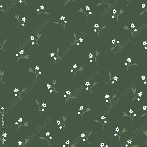 Simple vintage pattern. Small white flowers, green leaves. Dark green background. Fashionable print for textiles and wallpaper.