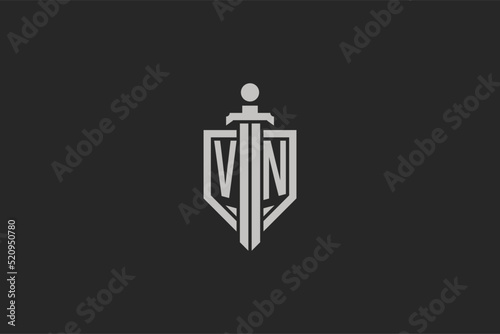 Letter VN logo with shield and sword icon design in geometric style photo