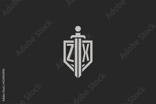 Letter ZX logo with shield and sword icon design in geometric style photo