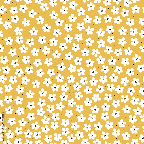 Simple vintage pattern. small white flowers and black dots. yellow background. Fashionable print for textiles and wallpaper.
