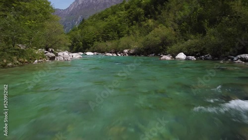 alpine emmerald river soca in slovenian alps 4k aerial view - fresh water concept	 photo