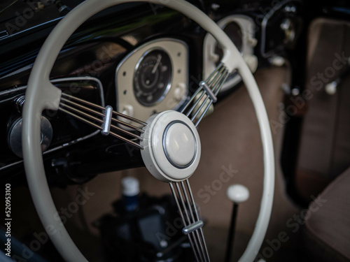 Dashboard and steering wheel of old-timer car © wlad074