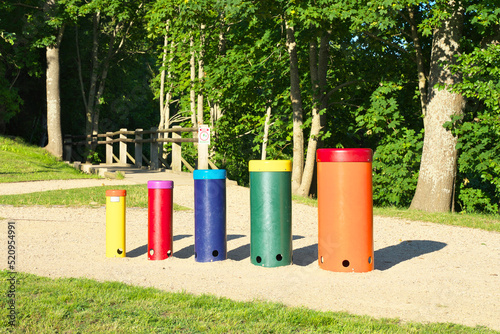 Musical instruments in the open air in the park. Outdoor drums Rainbow Sambas.