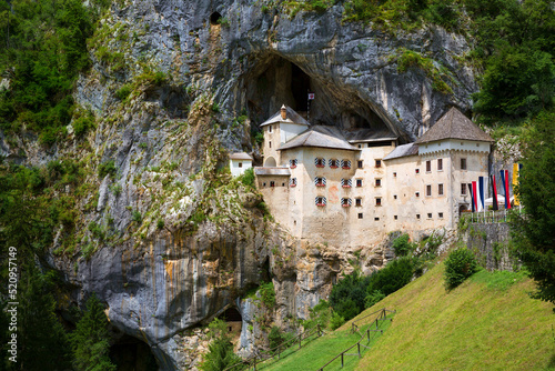 The Cave with the Renaissance Predjama Castle, Slovenia photo