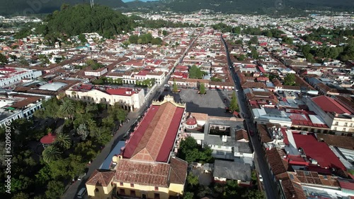 drone shot showing the main square, the church, the atrial cross and the south of the town of san cristobal de las Casas in Chiapas, Mexico photo