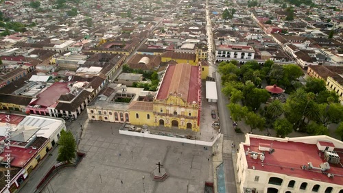 drone shot rotating over the main square, the atrial cross, the convent in san cristobal de las casas in chiapas, mexico photo