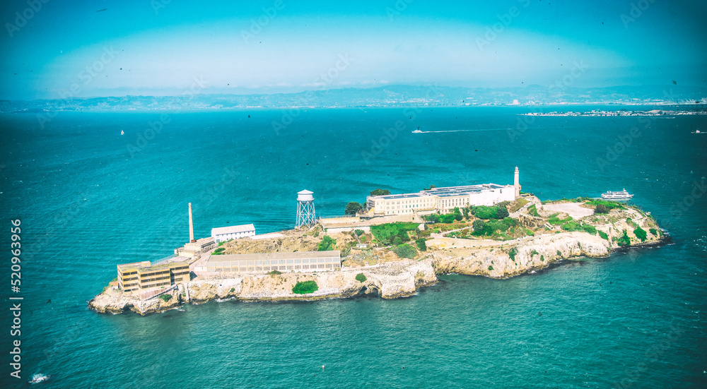 Alcatraz Island and Prison, aerial view from helicopter on a clear sunny day.
