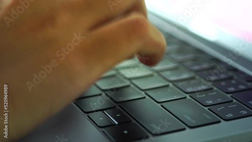 person typing on a computer labtop keyboard