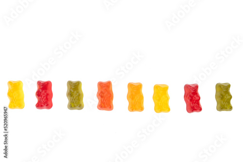 Row of jelly bears isolated on white background
