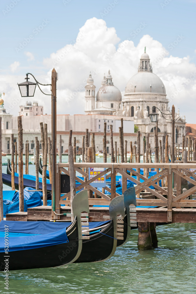 Gondolas at The Riva degli Schiavoni quay, Venice, Italy