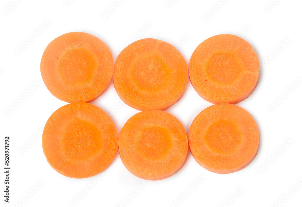 Fresh orange sliced carrots in stack isolated on white background with clipping path Fresh orange sliced carrots in stack isolated on white background with clipping path