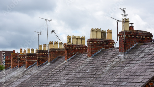 Clay chimney pots on rooftops