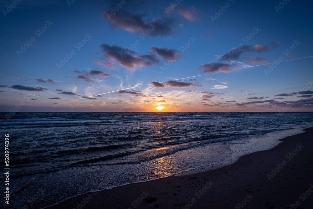 sunset on the beach north sea denmark hvide sande sunset on the beach north sea denmark hvide sande