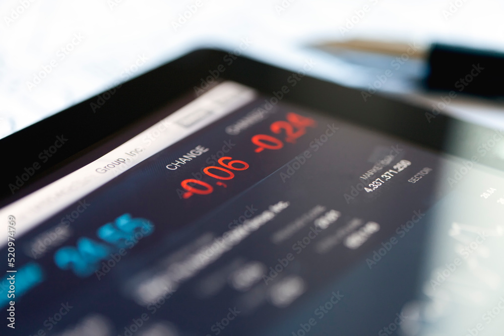 Business Market Data on a Digital Tablet Screen Business Market Data on a Digital Tablet Screen