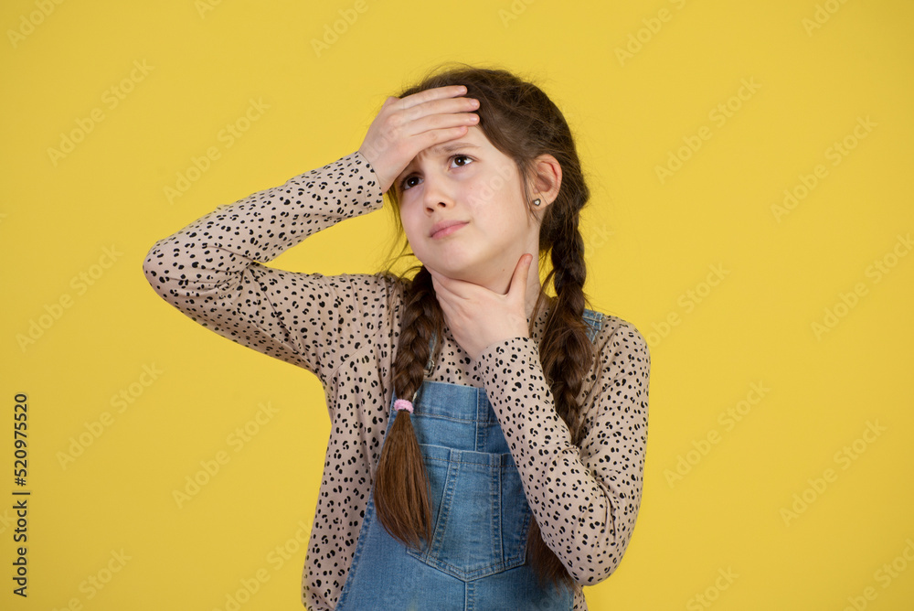 Sore throat remedies. Kid feels pain in throat. Girl cute child feels