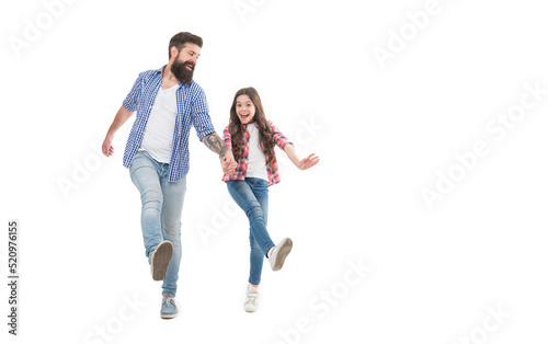 Unstoppable. Energetic daughter and father walk holding hands. Happy family in energetic mood. Photo shoot in studio. Staying energetic and positive. Enjoy fun. Feel pleasure. Energetic and active