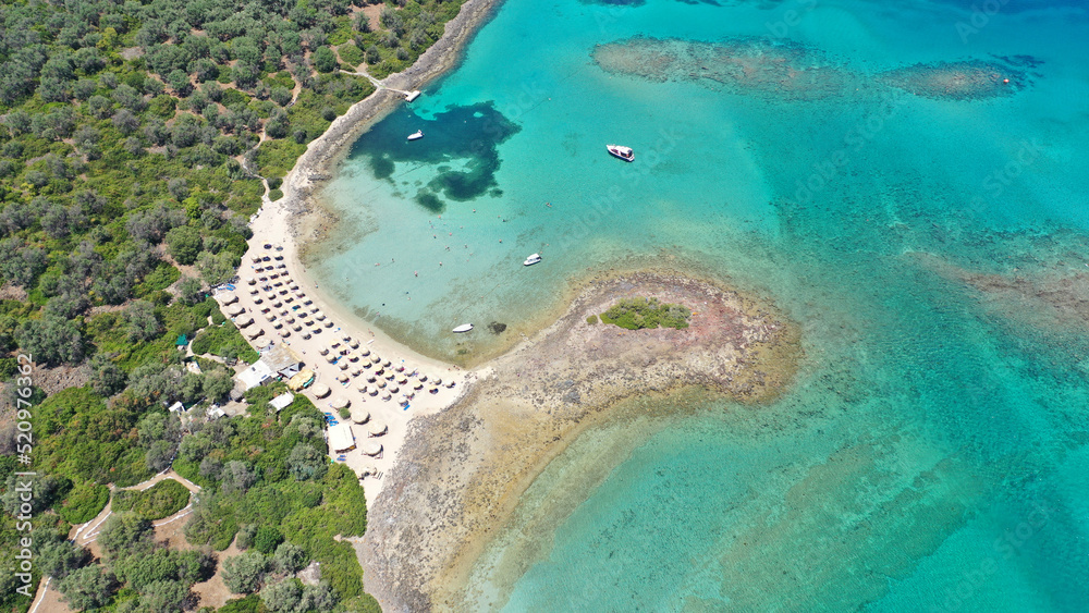 Fototapeta premium Aerial drone photo of tropical exotic paradise island complex in Mediterranean sea forming a blue lagoon archipelago with crystal clear turquoise sea sandy beaches