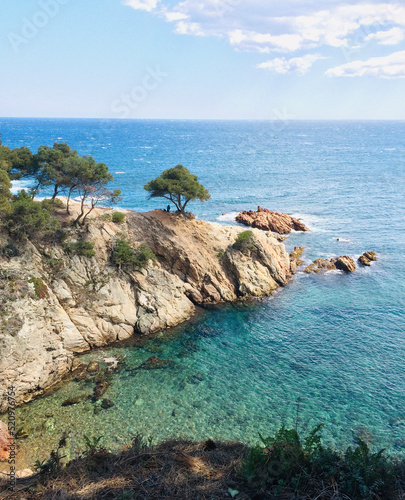 Photo Costa brava beach. Crystal clear waters of the Mediterranean sea.