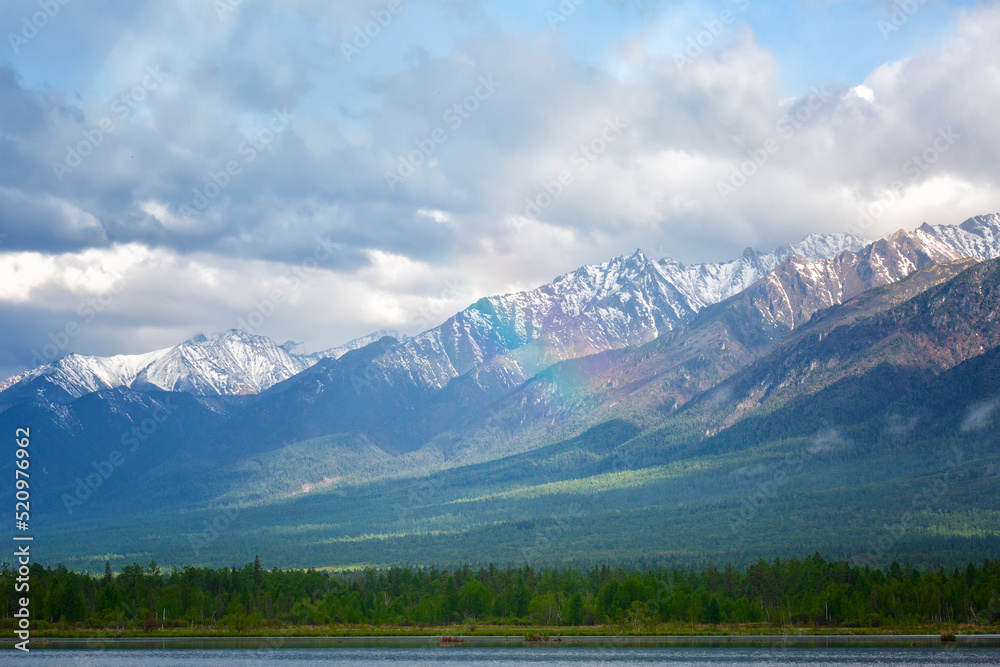 Rainbow over mountain peaks, Buryatia Rainbow over mountain peaks, Buryatia