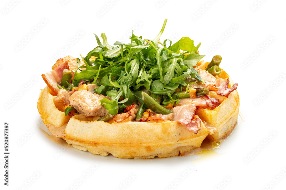 American Round Waffle. With bacon, chicken and arugula. On a white background, isolated. American Round Waffle. With bacon, chicken and arugula. On a white background, isolated.