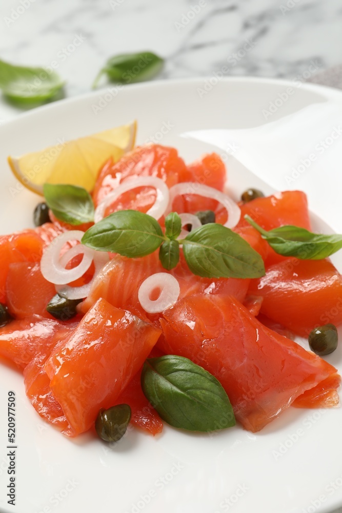 Delicious salmon carpaccio served on table, closeup Delicious salmon carpaccio served on table, closeup
