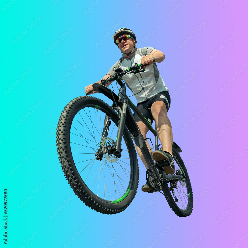 Naklejka premium Professional road cyclist in action on gradient multicolored neon background.