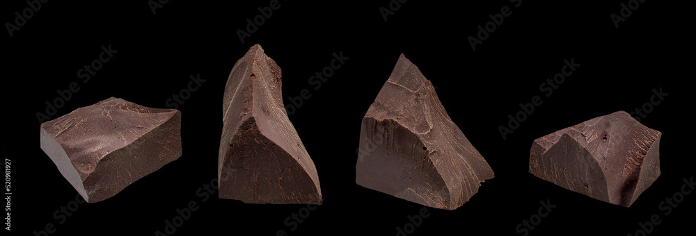 Naklejka premium Cracked chocolates / broken chocolate chips or chocolate parts from top view on isolated black background
