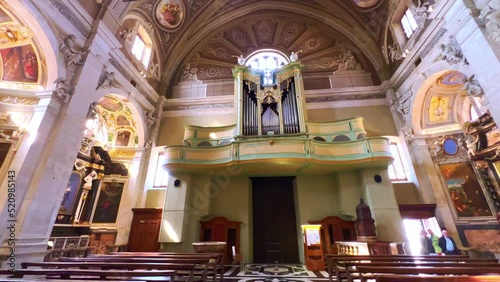 The organ and vault of Bellinzona Collegiate Church, Ticino, Switzerland photo