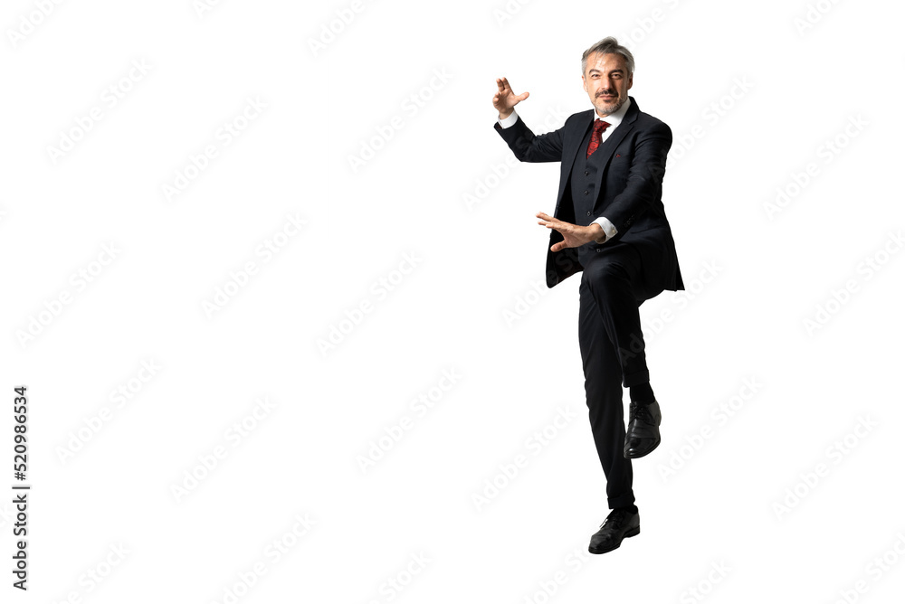 Full length portrait of senior Businessman in elegant blue suit standing in Kung-Fu posture. isolated on white background with copy space. Full length portrait of senior Businessman in elegant blue suit standing in Kung-Fu posture. isolated on white background with copy space.