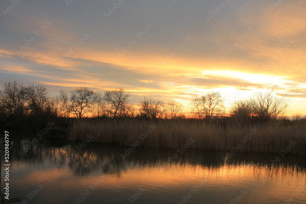Obraz premium Etang de l'or, natural lagoon near Montpellier in Languedoc Roussillon, Occitanie, France 