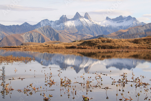 Guichard lake and Aiguilles d'Arves mountains in the french Alps, Savoie, Saint Sorlin d'Arves
