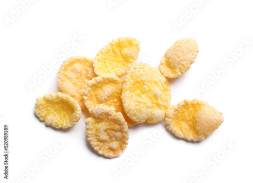 Heap of tasty crispy corn flakes isolated on white, top view