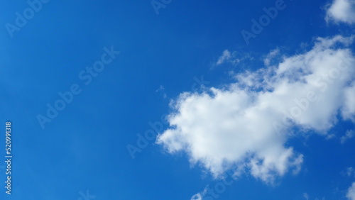 background clouds in a blue sky on a clear sunny day