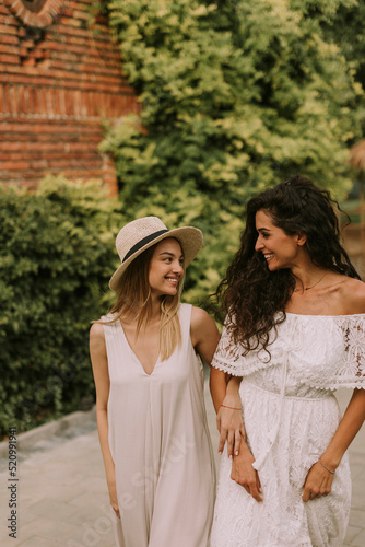 Pretty young women walking ...