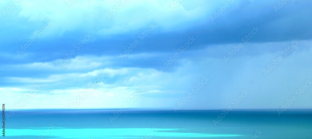 sky and rain clouds over the sea, stormy weather sky and rain clouds over the sea, stormy weather