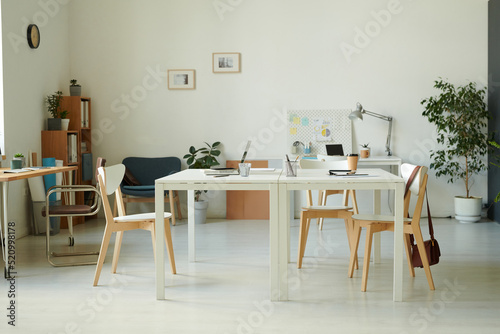 Horizontal image of modern office with workplace of business person with computers