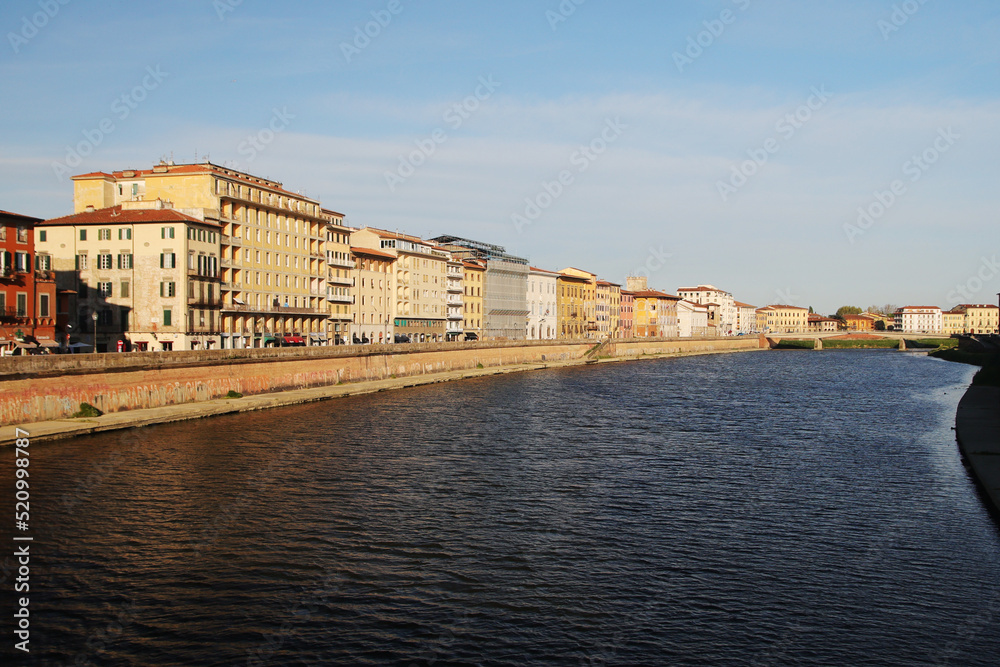 Old houses at the Arno river in Pisa, Italy
