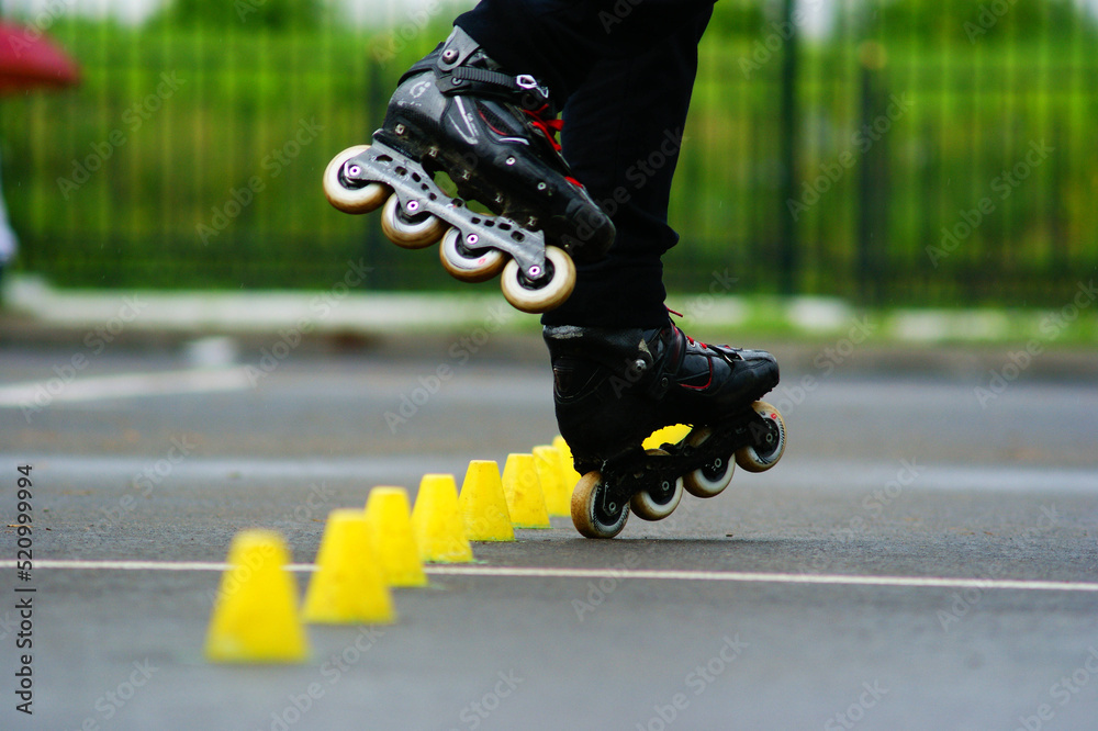 Cool roller skating tricks, roller skating, slalom Photos | Adobe Stock
