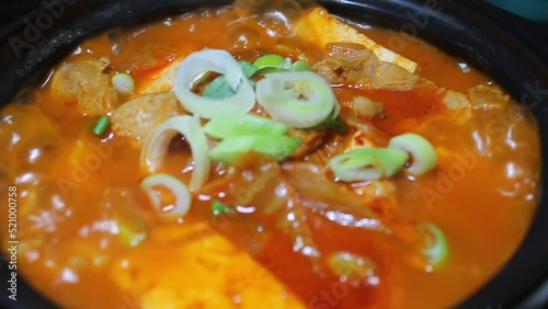돼지고기 김치찌개가 끓고 있는 모습 클로즈업 photo