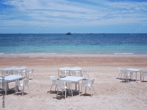Outdoor cafe on summer beach. © pkanchana